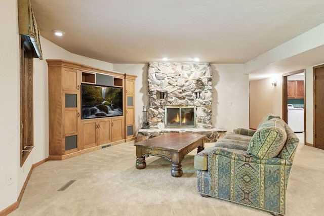 6517 Crackleberry Trl, Woodbury, MN 55129 - carpeted living area featuring washer / dryer and a fireplace