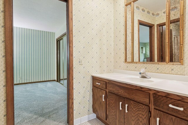 6517 Crackleberry Trl, Woodbury, MN 55129 - bathroom with wallpapered walls and vanity