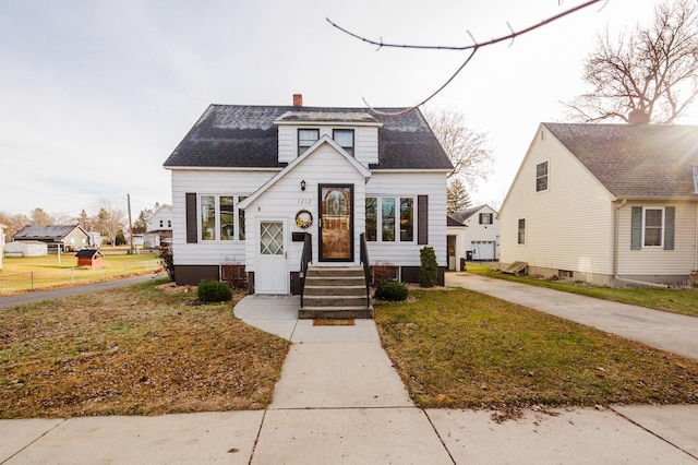 bungalow with a front lawn