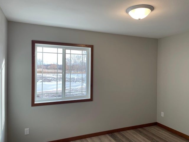 empty room featuring hardwood / wood-style floors