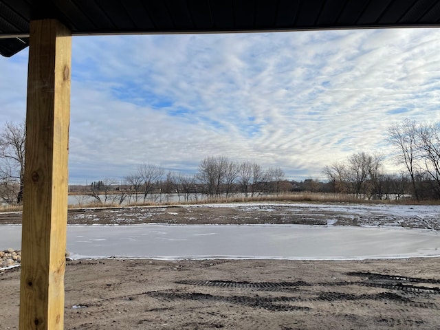 view of yard covered in snow