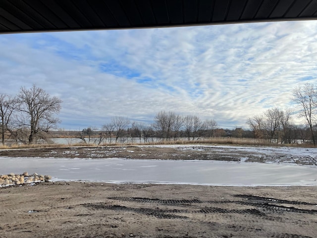 view of yard layered in snow