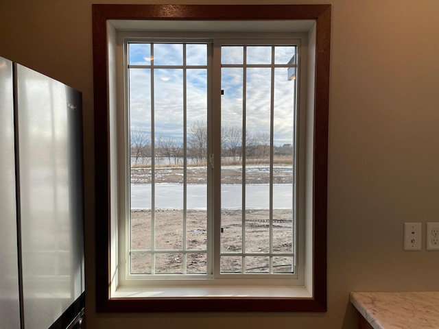 room details featuring stainless steel refrigerator