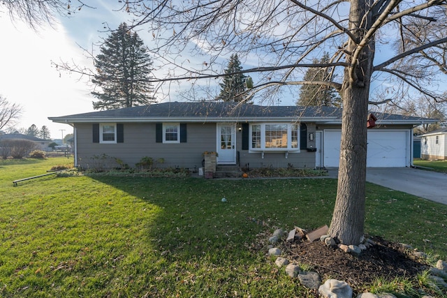 single story home featuring a garage and a front lawn