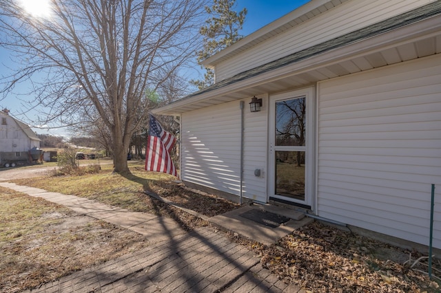 doorway to property with a wooden deck