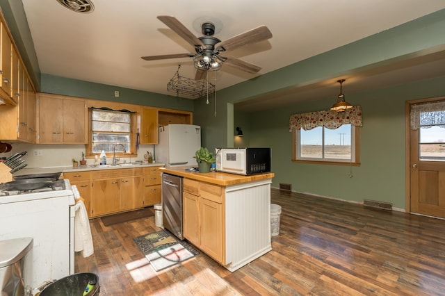 kitchen featuring pendant lighting, white appliances, dark hardwood / wood-style floors, wood counters, and light brown cabinets