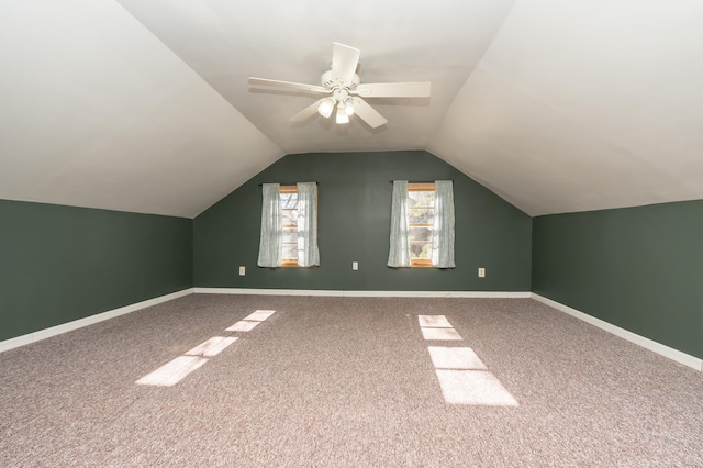 bonus room featuring vaulted ceiling, ceiling fan, and carpet floors