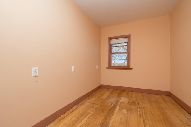 spare room featuring light hardwood / wood-style flooring