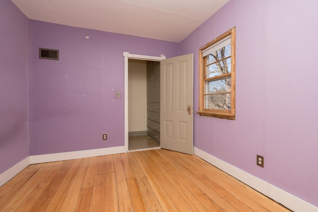 unfurnished bedroom featuring light hardwood / wood-style flooring