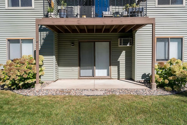 exterior space featuring a patio, a balcony, and a yard