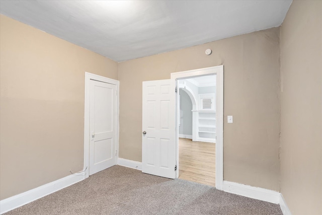 view of carpeted spare room