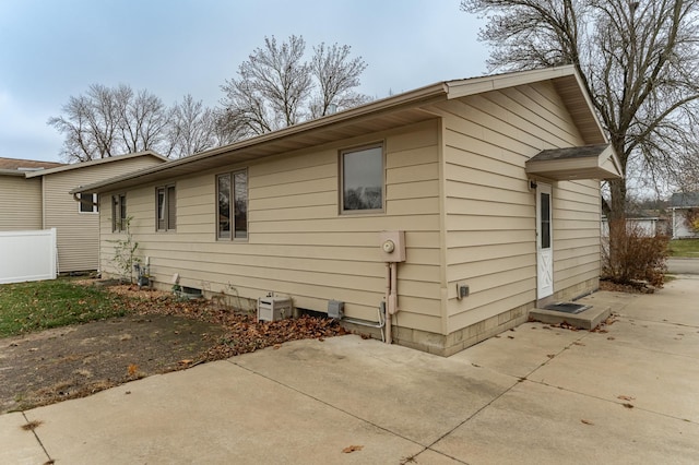 view of property exterior featuring a patio