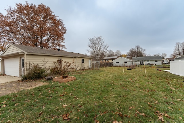 view of yard featuring a garage