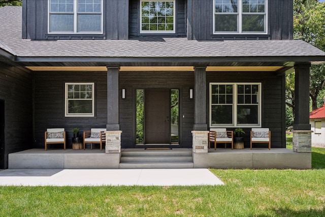 doorway to property with covered porch