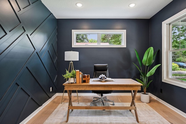 office space featuring light wood-type flooring