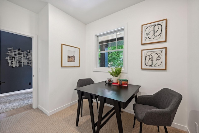 dining area with light wood-type flooring