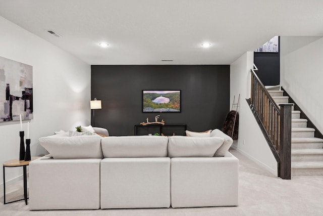 living room with light colored carpet