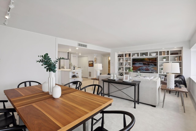 1920 1st St Unit 2001, Minneapolis, MN 55454 - dining area featuring light colored carpet and built in features
