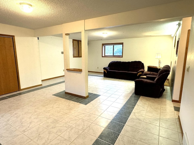 tiled living room with a textured ceiling