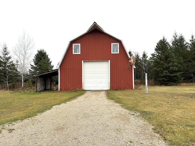 garage with a lawn