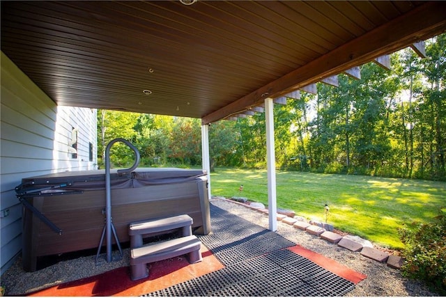 view of patio with a hot tub