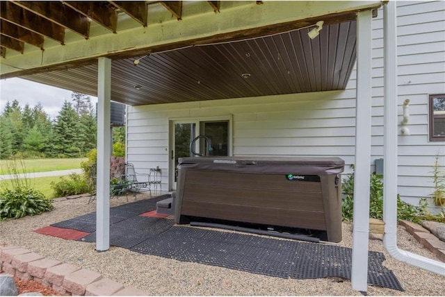 view of patio / terrace featuring a hot tub