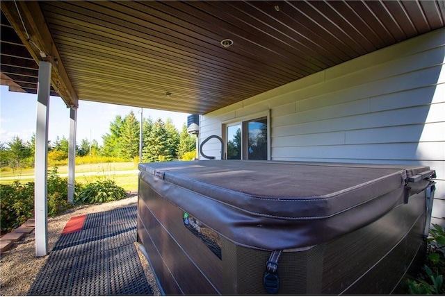 view of patio / terrace featuring a hot tub