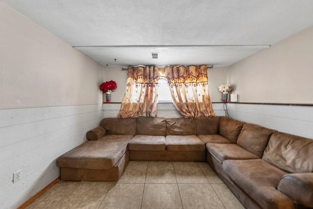 living room with light tile patterned flooring