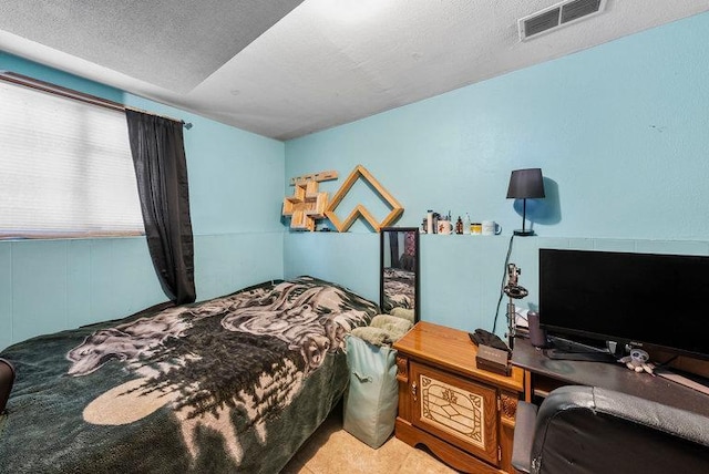 bedroom with a textured ceiling