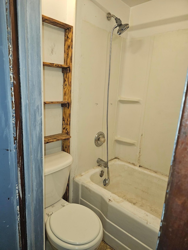 bathroom featuring toilet and shower / bathing tub combination