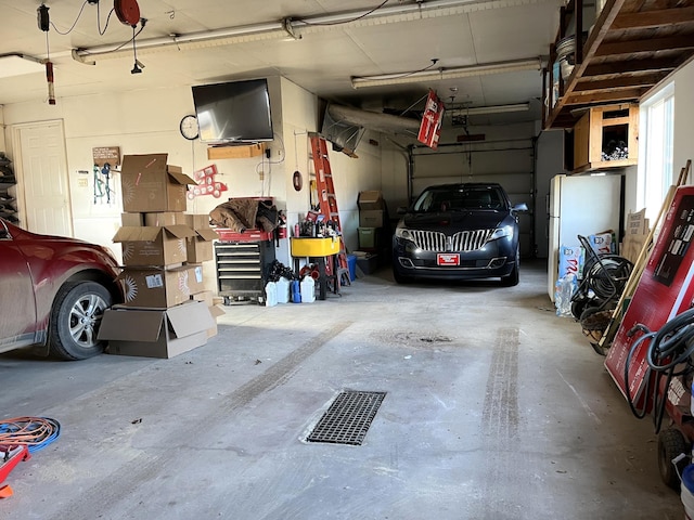 garage with white fridge