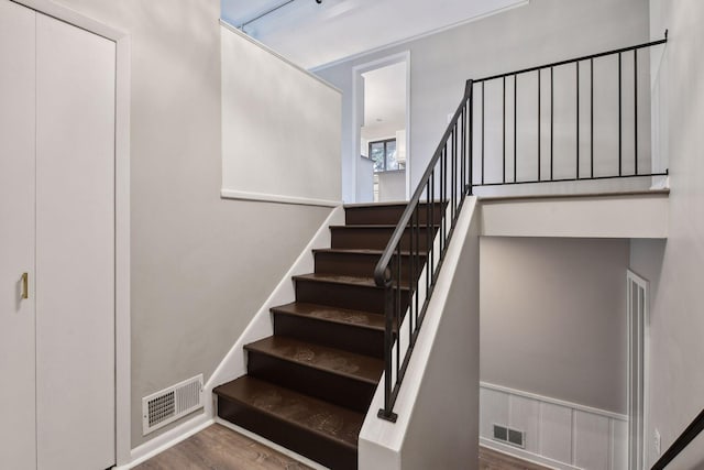 stairway with wood-type flooring