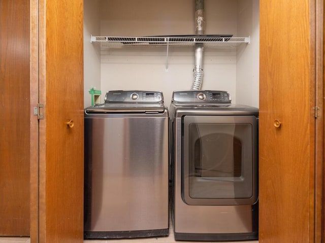 laundry area featuring independent washer and dryer