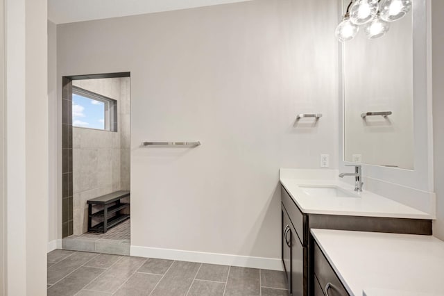 bathroom with vanity and tile patterned floors