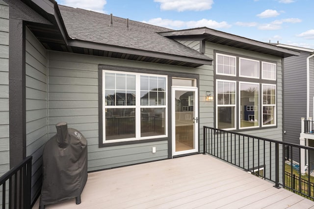 wooden deck featuring grilling area