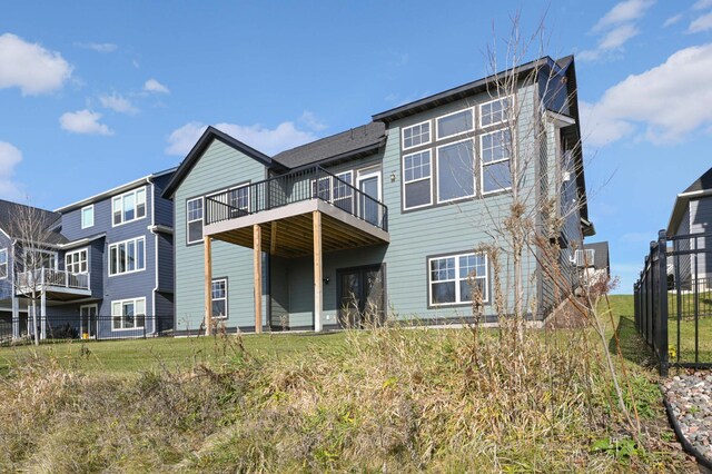 rear view of property with a deck