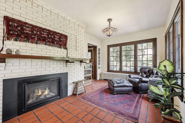 interior space featuring a fireplace and radiator heating unit