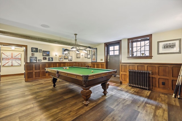 recreation room with dark hardwood / wood-style flooring, billiards, and radiator