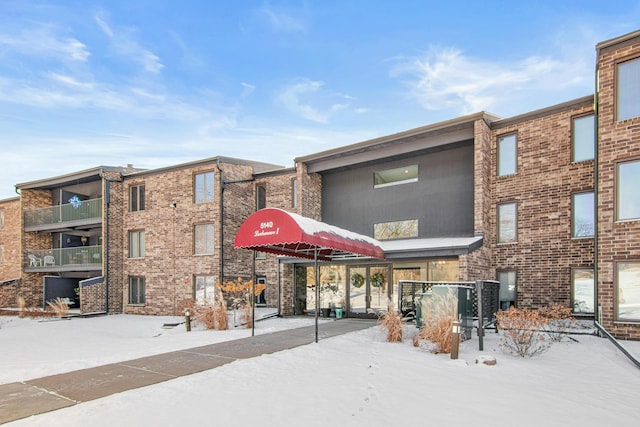 view of snow covered property