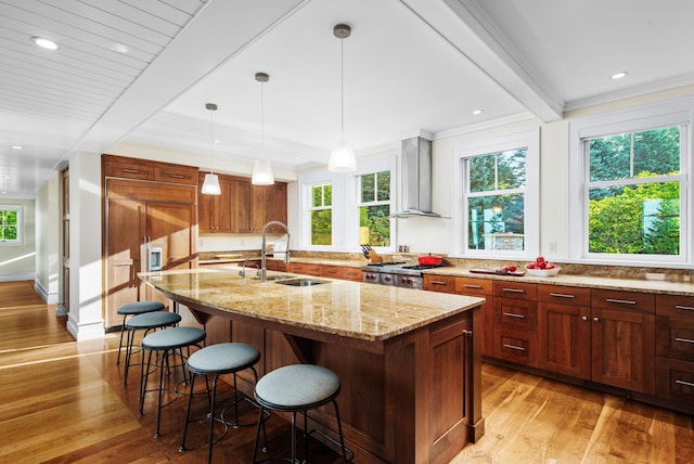 19752 Halwood Rd, Glenwood Twp, MN 56334 - kitchen featuring wall chimney exhaust hood, a sink, light wood-type flooring, light stone countertops, and beamed ceiling