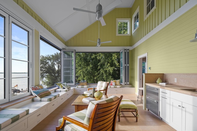 19752 Halwood Rd, Glenwood Twp, MN 56334 - sunroom / solarium featuring high vaulted ceiling and wood walls