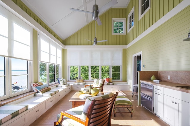 19752 Halwood Rd, Glenwood Twp, MN 56334 - sunroom with high vaulted ceiling, plenty of natural light, a water view, and tile patterned flooring