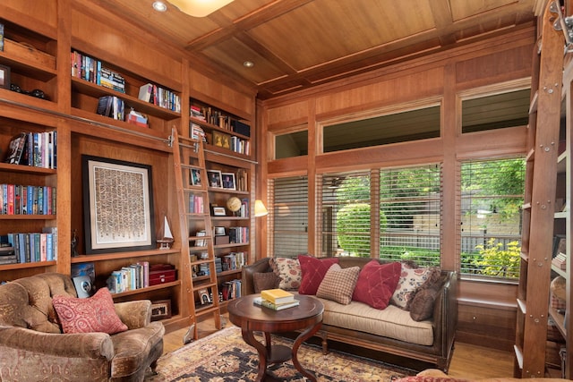 19752 Halwood Rd, Glenwood Twp, MN 56334 - living room with wood ceiling, built in features, wood walls, and wood finished floors