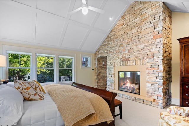 19752 Halwood Rd, Glenwood Twp, MN 56334 - bedroom with beam ceiling, a stone fireplace, and high vaulted ceiling