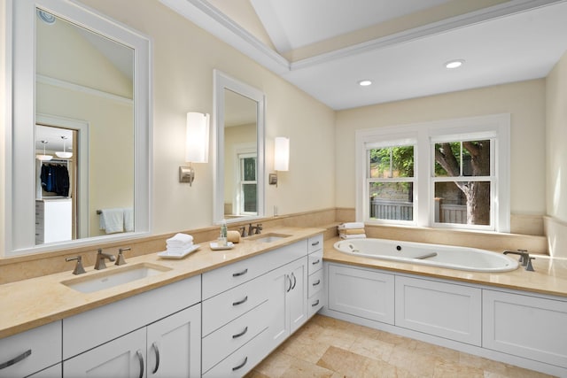 19752 Halwood Rd, Glenwood Twp, MN 56334 - full bathroom with double vanity, a garden tub, lofted ceiling, and recessed lighting