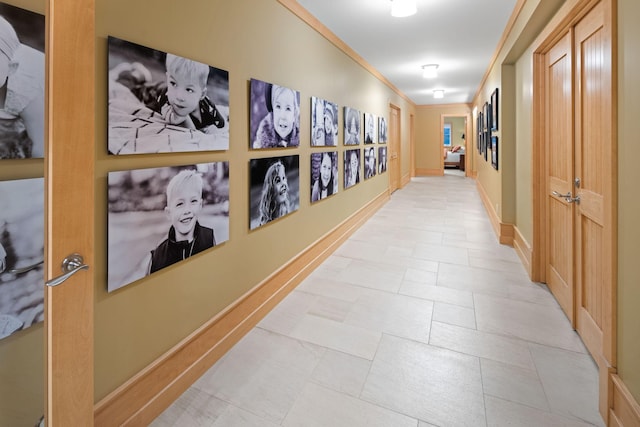 19752 Halwood Rd, Glenwood Twp, MN 56334 - hallway featuring baseboards and crown molding