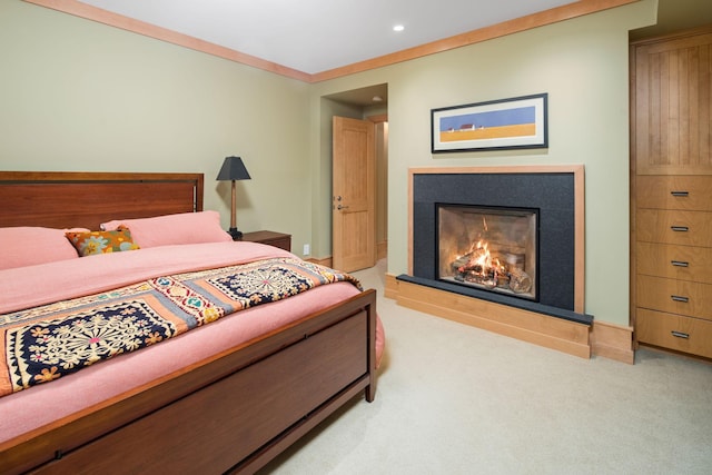 19752 Halwood Rd, Glenwood Twp, MN 56334 - bedroom with light colored carpet, a warm lit fireplace, recessed lighting, and baseboards