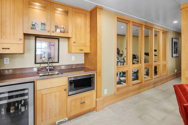 19752 Halwood Rd, Glenwood Twp, MN 56334 - kitchen with beverage cooler, stainless steel microwave, light brown cabinetry, a sink, and recessed lighting
