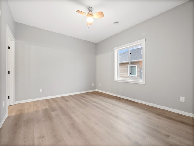 unfurnished room featuring ceiling fan and light hardwood / wood-style floors