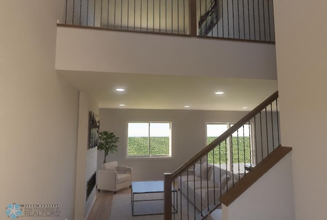 staircase featuring hardwood / wood-style flooring